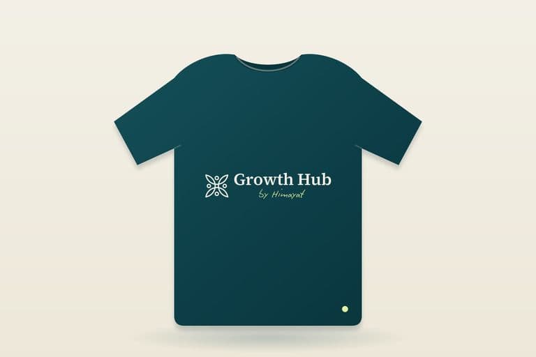 Growth Hub Tee — teal organic cotton tee with the Growth Hub by Himayat lockup on the chest